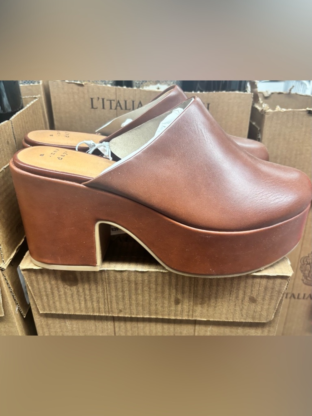 A New Day Brown Leather-Platform Clogs
New with tags. Never Worn.